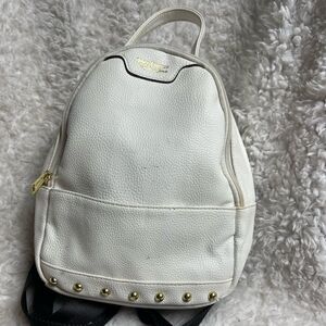 Juicy Couture white faux leather small backpack  black straps &gold tone studs